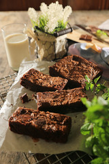 abstract topping chocolate brownies cake with milk and chocolate bar
