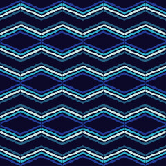 Ethnic boho seamless pattern. Zigzag texture. Retro motif. Textile rapport.