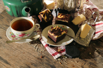 abstract topping chocolate cheese brownies cake with black tea