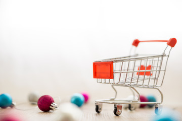 shopping cart and christmas balls