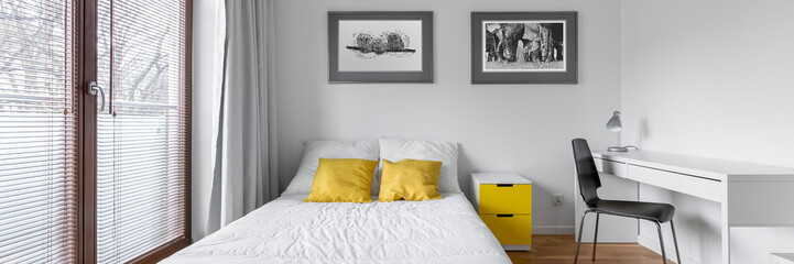 Bedroom with countertop desk