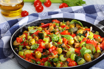 caponata with vegetables in a skillet
