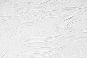 A white background with a paint texture on the wall. Pattern with drawings of handmade.