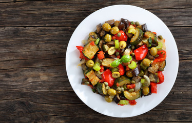 tasty Caponata with vegetables on plate