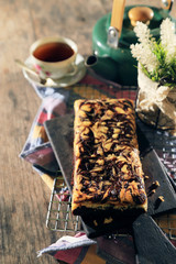 abstract topping chocolate brownies sliced cake with black tea