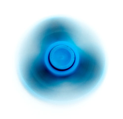 Blue fidget spinner rotating on a white background