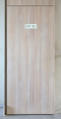 Staff only room. Inscription label on the wooden door.