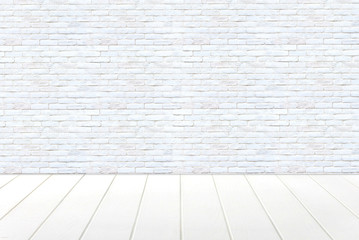 room interior with white brick wall and white wood floor.