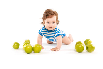 Fototapeta na wymiar small child with a lot of apples