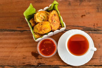 Chicken tofu with a cup of tea.
