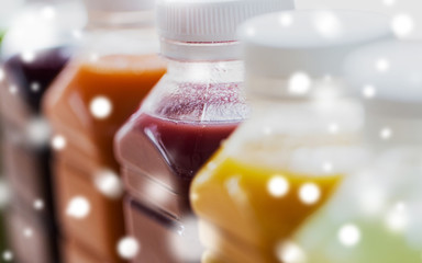 bottles with different fruit or vegetable juices