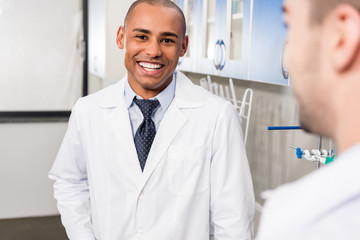 african american doctor in lab coat