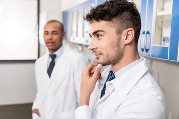 handsome medical worker in lab coat