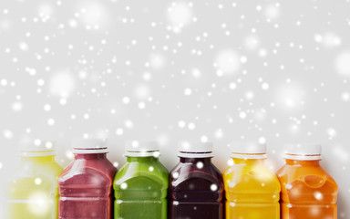 bottles with different fruit or vegetable juices