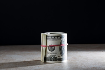 Roll of dollars on the combined background.psd