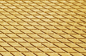 Orange color cement floor pattern with blur effect.