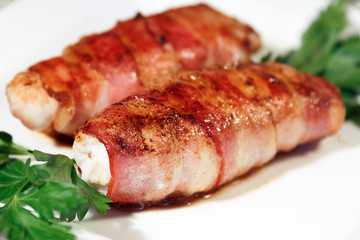 Hot dish. Meat rolls with a stuffing. Shallow depth of field.