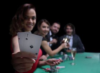 adult group celebrating friend winning blackjack