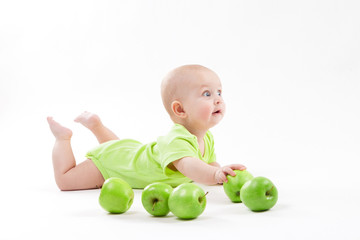 Fototapeta premium cute baby lying on the background and smiling