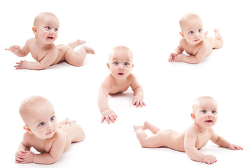Naked cute smiling baby in the cap of the pilot is flying on a white background