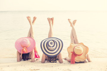 Portrait of Woman Group posing at the Beach with Attractive Smiling, People with Summer Concept. Vintage Tone.