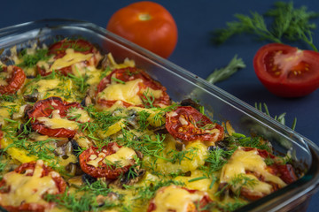 Whole baked casserole with tomato