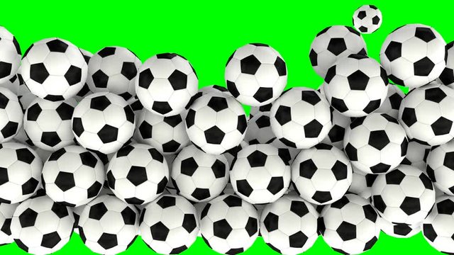 Animated a lot of simple soccer balls with plain white and black material falling and tumbling filling up container against green background. Front camera view.