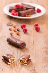 Chocolate rolls with hazelnuts and raspberries. 