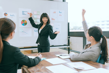 pretty young business woman speaker reporting