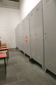 inside a factory locker with lockers