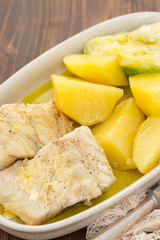 boiled cod fish with potato on dish