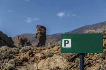 Green poster with rocks in the background, in the Teide National Park, Tenerife