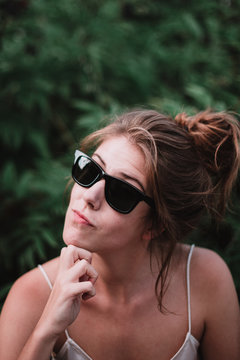 Playful model in sunglasses