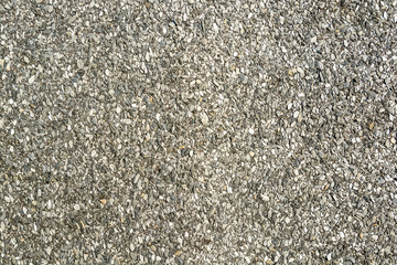 Abstract background of closeup dark old asphalt