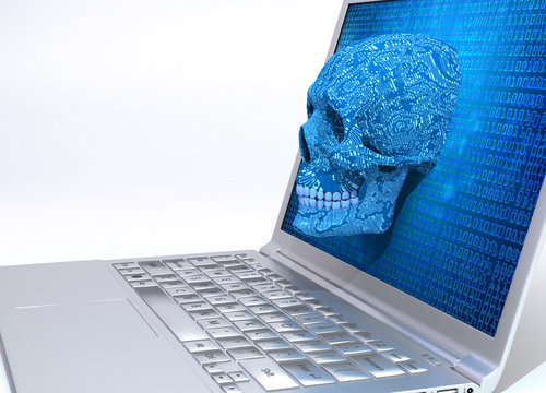 Skull Is Coming Out Of Computer Display Cyber Attack