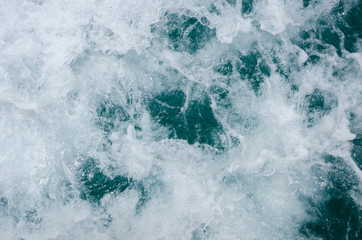 Close up blue water splash.