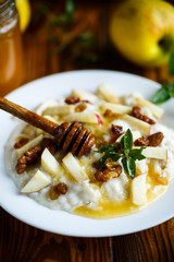 sweet milk oatmeal with apples, nuts and honey