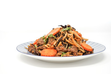 fried beef noodle food on the table