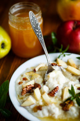 sweet milk oatmeal with apples, nuts and honey