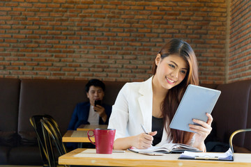 Asian business man and Asian business woman.