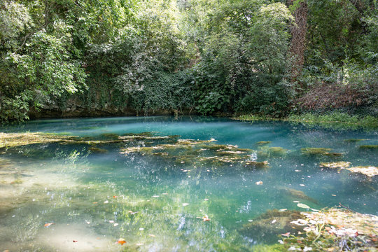 Resurgence of the Timavo river by a church in San Giovanni di Duino, or San Giovanni in Tuba. Karst river, Fruglia, Triest region, Italy.
