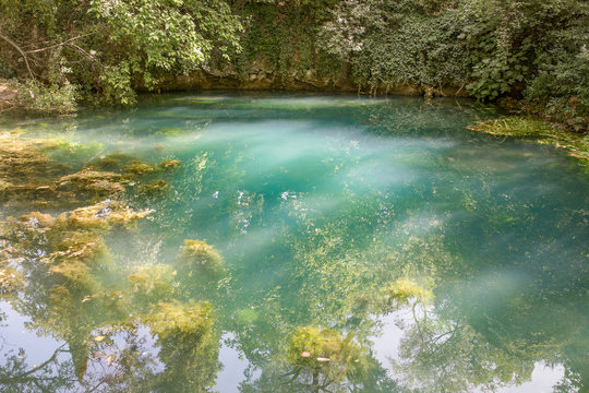 Resurgence of the Timavo river by a church in San Giovanni di Duino, or San Giovanni in Tuba. Karst river, Fruglia, Triest region, Italy.