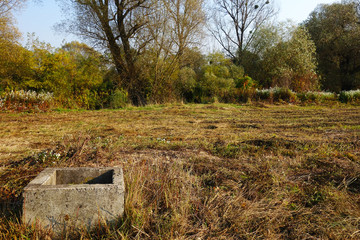 Abandoned irrigation shaft in nature