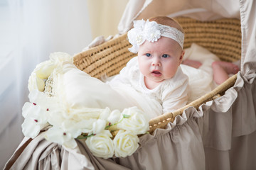 Little baby girl in a beautiful dress