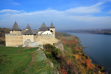 Naklejka premium Beautiful landscape with ancient medieval fortress in Khotyn on hill above river.