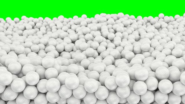 Animated a great amount of white plain Golf balls falling and tumbling filling up container against green background. High angle shot. 