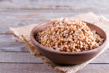 Boiled buckwheat porridge in a ceramic bowl