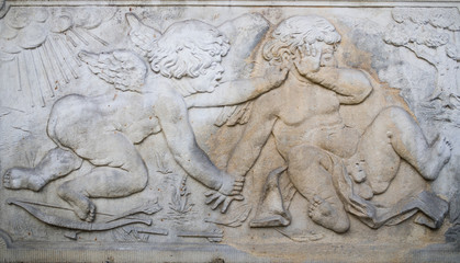 Ornaments, moldings, gargoyle, low reliefs in a sandstone, granite, concrete. sculpting details in...