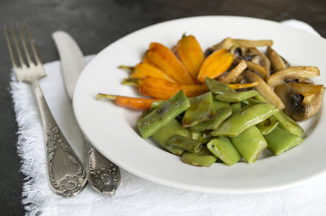 Roasted vegetables. Green beans, mushrooms, carrots.