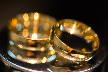 gold rings closeup on dark background